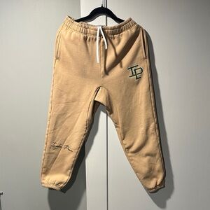 Inaka Power Beige Joggers with Green Logo